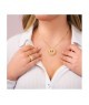 Collana girocollo placcato oro giallo con pendente circolare in pavè di zirconi e fiore incastonato al centro Mod.XG [0233149d]