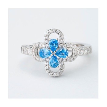 Anello con motivo floreale definito da zirconi e fiore centrale acquamarina mod. xan224a [70c5d662]