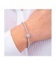 Bracciale rigido con motivo floreale definito da zirconi e fiore centrale crystal mod. xb1048 [dd75fcfd]