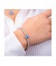 Bracciale rigido con motivo floreale definito da zirconi e fiore centrale acquamarina mod. xb1048a [989e5e78]
