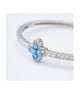 Bracciale rigido con motivo floreale definito da zirconi e fiore centrale acquamarina mod. xb1048a [2f839f7c]
